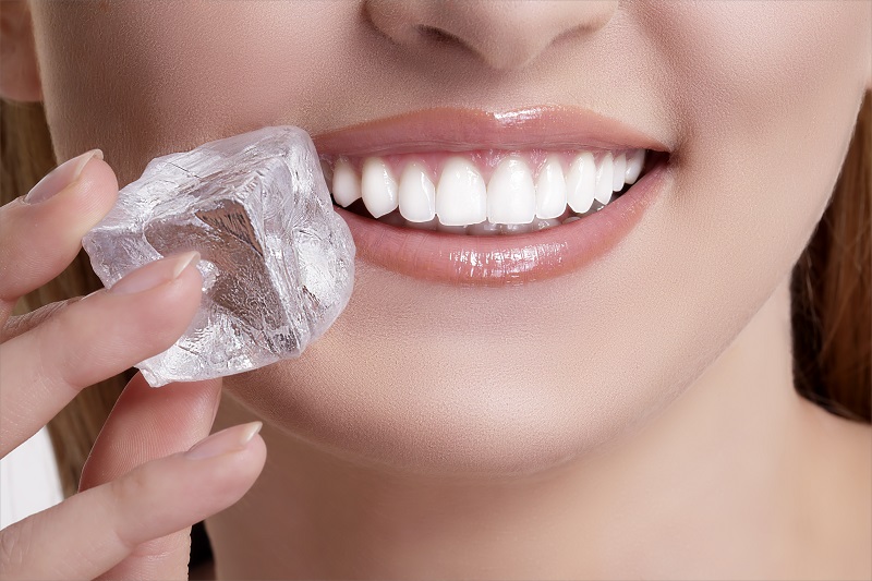 Porcelain veneers patient biting ice