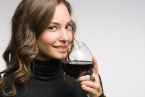 Woman enjoying glass of wine during the holidays in Las Vegas, NV.